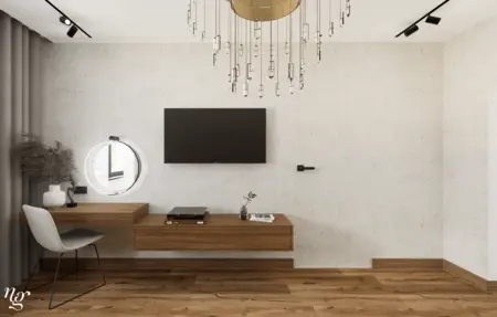 Nowoczesne wnętrze z biurkiem, telewizorem i oświetleniem.