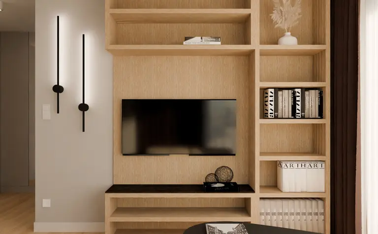 Salon z nowoczesną półką, telewizorem i designerskim stolikiem.