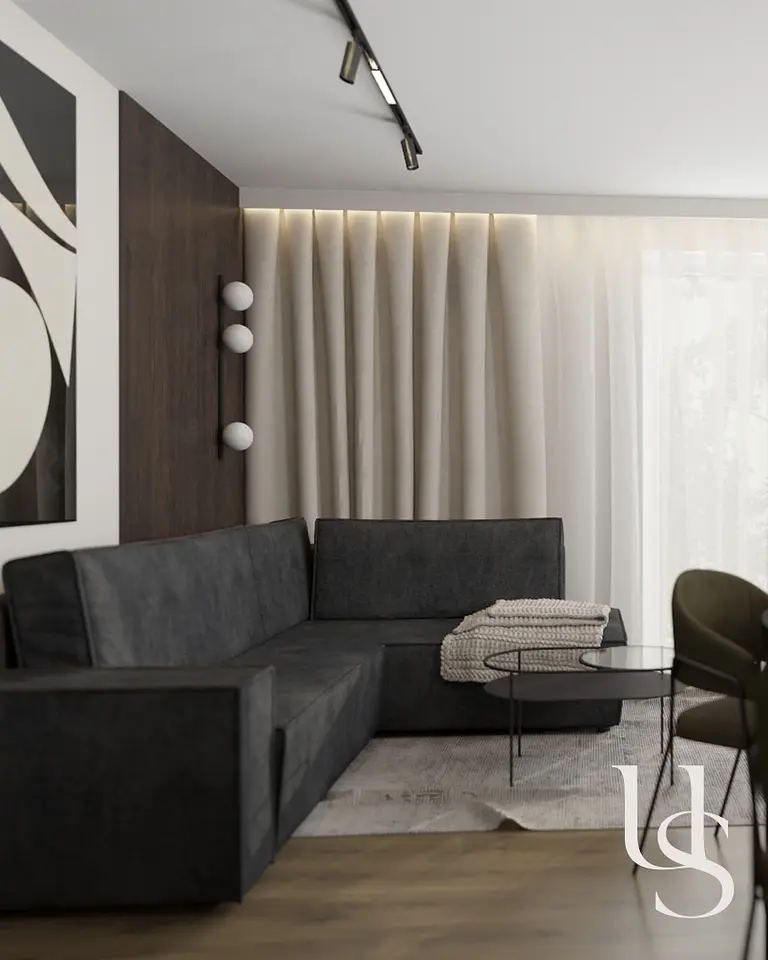 Wnętrze salonu w stylu quiet luxury, współczesne z ciemną sofą i drewnianymi detalami.