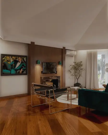 Wnętrze salonu w stylu art deco, quiet luxury, współczesnym z zieloną sofą.