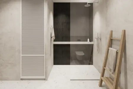 Nowoczesna łazienka w stylu japandi i minimalistycznym z szarymi płytkami.