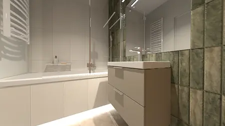 Współczesna łazienka z białą umywalką i zielonymi kafelkami