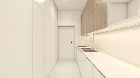 Kuchnia w stylu minimalistycznym z białymi meblami i drewnianymi detalami.