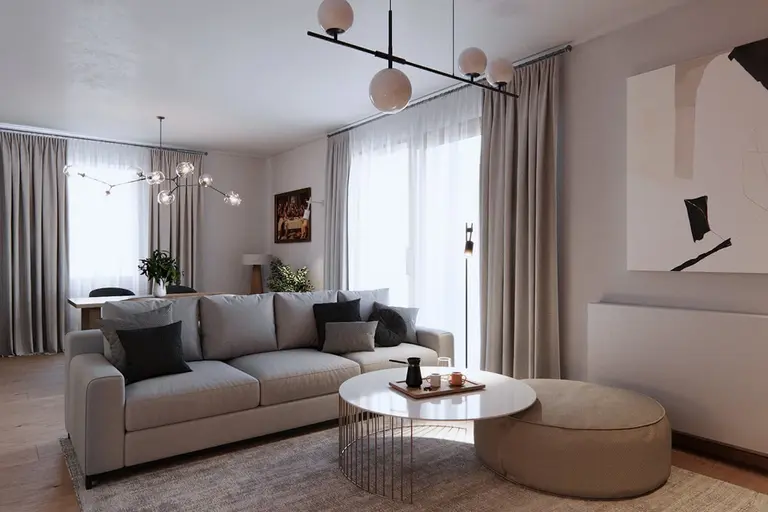Wnętrze salonu w stylu eklektycznym i minimalistycznym z jasnymi zasłonami oraz nowoczesnym oświetleniem.