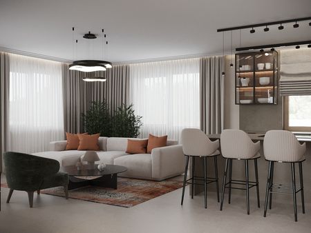 Wnętrze salonu w stylu minimalistycznym z jasnymi meblami i roślinami.