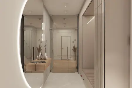 Przedpokój z beżowymi ścianami, lustrem i drewnianymi akcentami w stylu glamour.