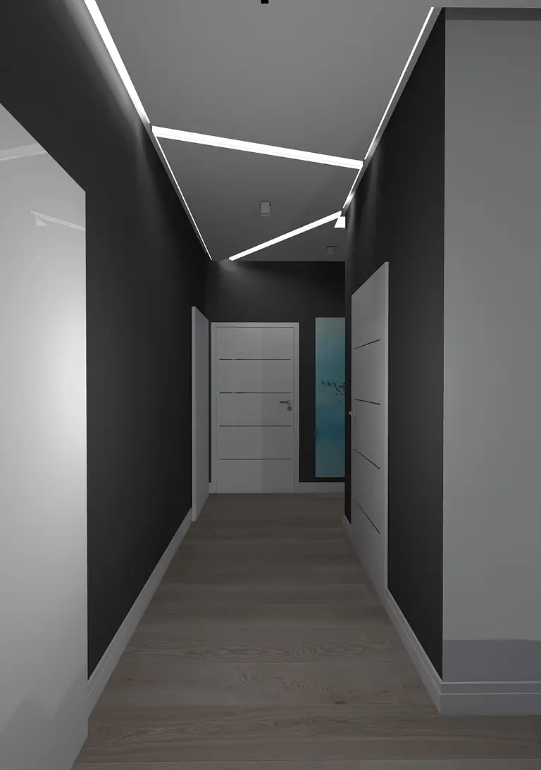 Korytarz w stylu japandi z minimalistycznym oświetleniem i drewnianą podłogą.
