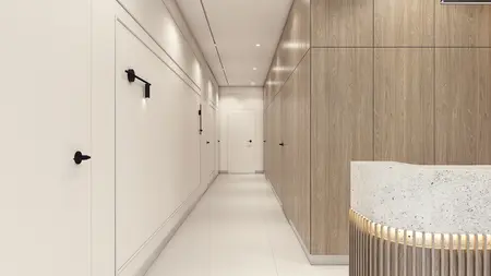 Przedpokój minimalistyczny z białymi ścianami i drewnianymi detalami, nowoczesny design.