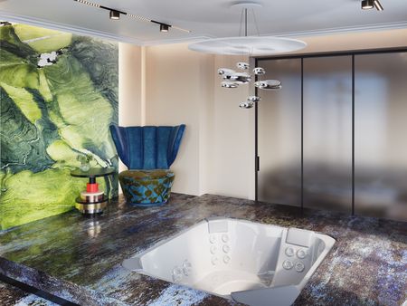 Wnętrze z jacuzzi, kolorową ścianą oraz nowoczesnym oświetleniem.