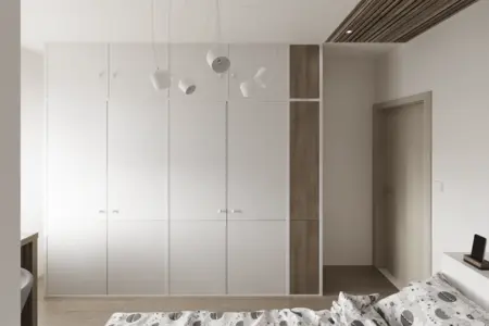 Garderoba w stylach industrialnym, japandi i minimalistycznym z białymi meblami.