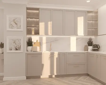 Nowoczesna kuchnia w stylu quiet luxury z beżowymi meblami i białym blatem.