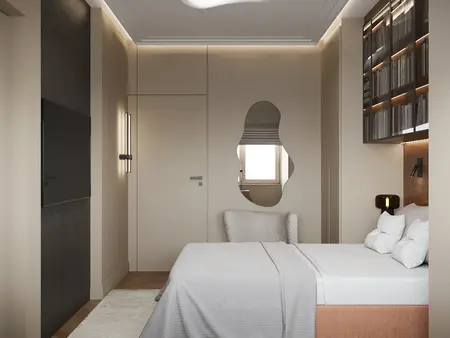 Sypialnia w stylu minimalistycznym z beżowym łóżkiem i nowoczesnymi detalami.