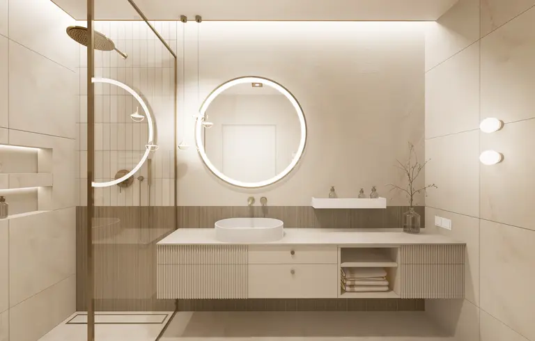 Nowoczesna łazienka z minimalistycznym designem, białymi meblami i okrągłym lustrem