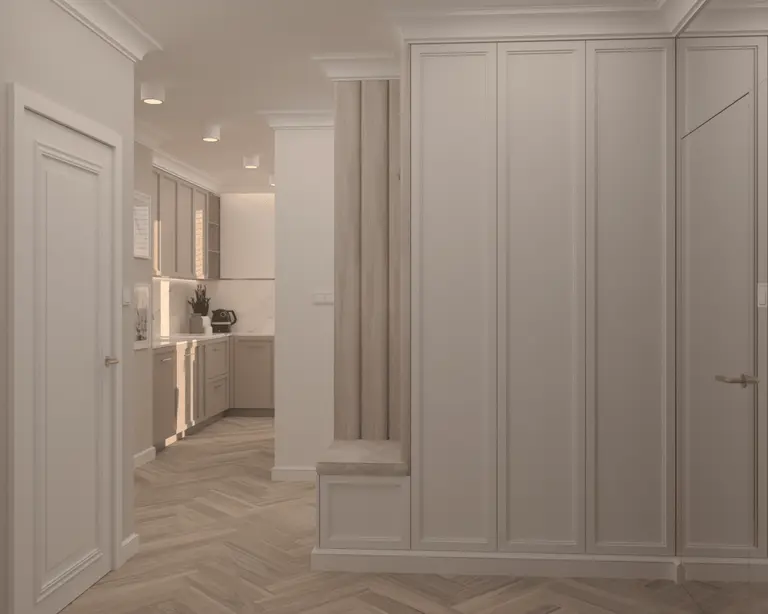 Wnętrze nowoczesnej kuchni w stylu quiet luxury z beżowymi meblami.