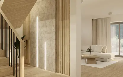 Wnętrze salonu w stylu japandi, minimalistycznym i skandynawskim z drewnianą podłogą.