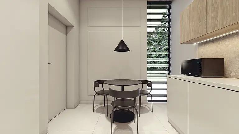 Nowoczesne wnętrze kuchni z minimalistycznym stołem i krzesłami.