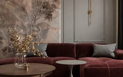 Wnętrze salonu w stylu eklektycznym z burgundową sofą, vintage stolikiem i quiet luxury akcentami.