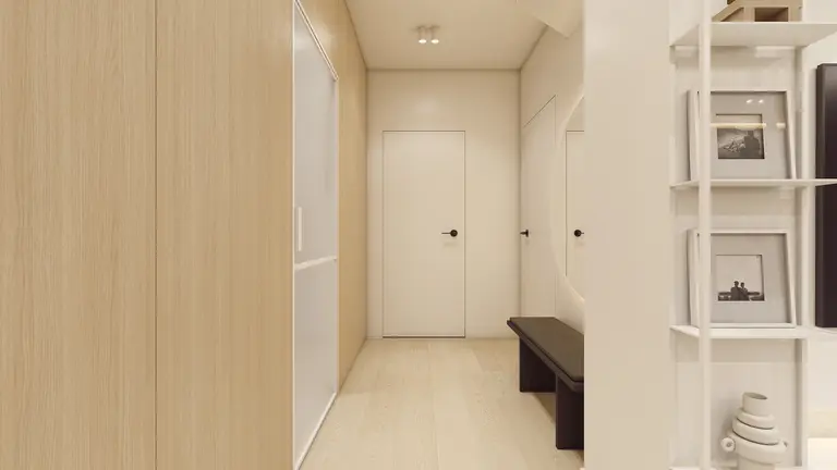 Przedpokój w stylu japandi i minimalistycznym z drewnianymi akcentami.