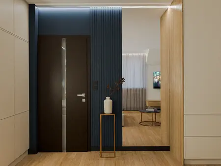 Przedpokój w stylu quiet luxury z niebieskimi ścianami i drewnianą podłogą.