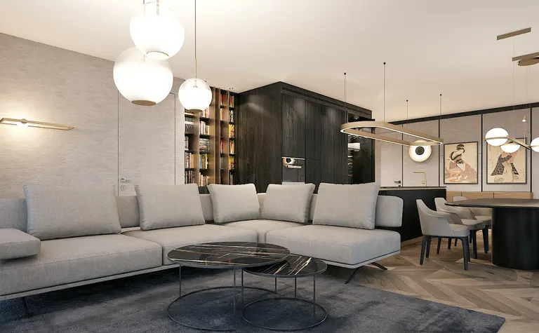 Przestronny salon z szarą narożną sofą, czarnymi stolikami kawowymi i designerskimi lampami. W tle widoczne regały na książki, jadalnia z ciemnym stołem i stylowe obrazy na ścianie.