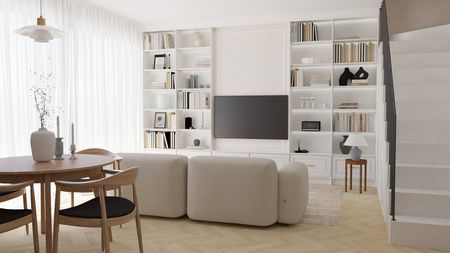 Wnętrze salonu z białą kanapą, drewnianym stołem i regałem art deco, minimalistycznym oraz tradycyjnym.