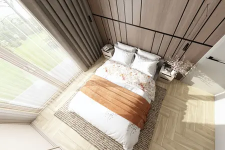 Sypialnia z drewnianą ścianą, łóżkiem i roślinami w stylu minimaluxe