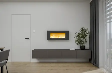 Minimalistyczne wnętrze z szarym meblem, rośliną i nowoczesnym kominkiem.