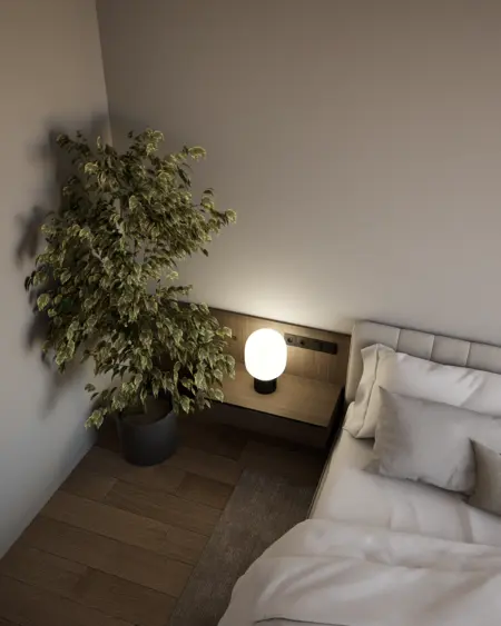 Sypialnia z minimalistycznym wystrojem, nowoczesną lampą i prowansalską rośliną.