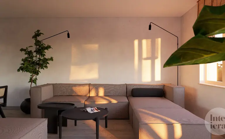 Wnętrze salonu w stylu japandi i minimalistycznym z rośliną.