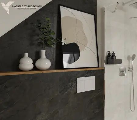 Nowoczesna łazienka z ciemnymi płytkami i boho dodatkami.