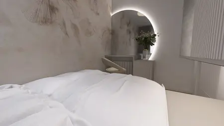Sypialnia z białą pościelą, minimalistycznym lustrem i nowoczesną aranżacją.