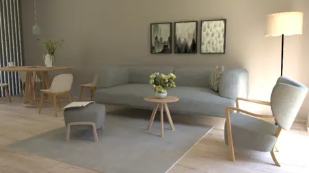 Wnętrze salonu w stylu boho i skandynawskim z szarym narożnikiem.