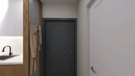 Przedpokój w stylu minimalistycznym z beżowymi akcentami i nowoczesnymi drzwiami.