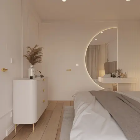 Wnętrze sypialni z beżowymi meblami i lustrem w stylu quiet luxury.