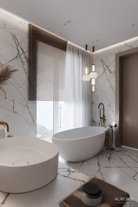 Nowoczesna łazienka z wanną, umywalką i marmurowymi akcentami w stylu dopamine decor i minimaluxe.