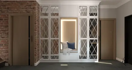 Stylowy przedpokój z ceglaną ścianą i białą zabudową rustykalną.