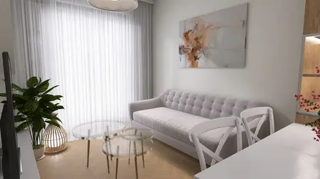 Wnętrze salonu z minimalistycznym designem, szarym wyposażeniem i nowoczesnym oświetleniem.