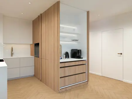 Wnętrze kuchni w stylu japandi i minimalistycznym z drewnianymi meblami.