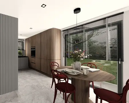 Wnętrze kuchni w stylu industrialnym z drewnianymi meblami i nowoczesnym oświetleniem.