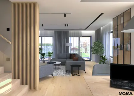 Współczesny salon z szarymi meblami i drewnianą podłogą, rośliny w tle.