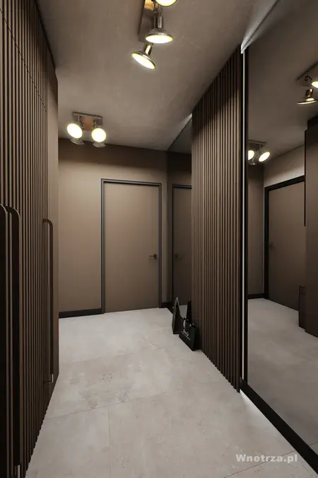 Przedpokój z brązowymi panelami i oświetleniem, nowoczesny design.
