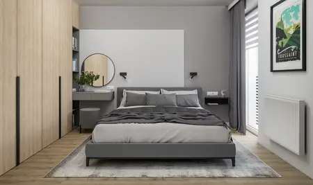 Sypialnia w stylu minimalistycznym z nowoczesnymi meblami i delikatnymi akcentami.