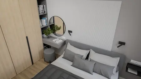 Sypialnia z szarym łóżkiem, drewnianą szafą i minimalistycznym biurkiem, soft minimalizm.