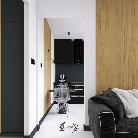Kuchnia w stylu industrialnym i nowoczesnym z czarnymi meblami i drewnianymi detalami.