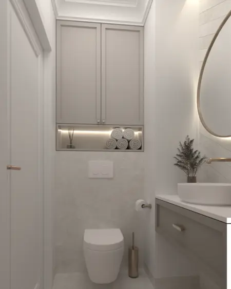 Nowoczesna łazienka w stylu quiet luxury z szarymi meblami i eleganckimi akcesoriami.