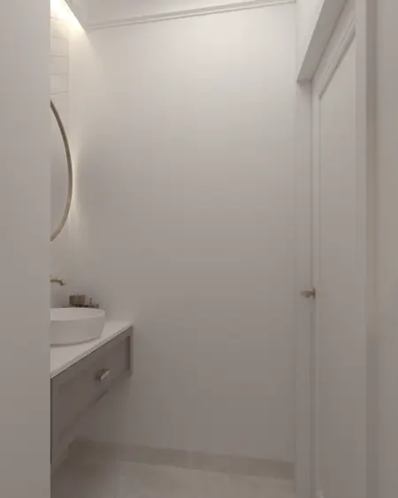 Nowoczesna łazienka z białą umywalką, szarymi ścianami i detalami w stylu quiet luxury.