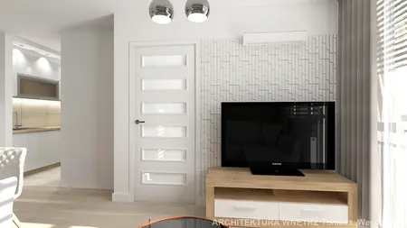 Wnętrze z telewizorem na drewnianym stoliku i białymi meblami. Styl współczesny.