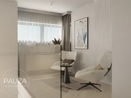 Pracownia architektoniczna z nowoczesnymi meblami i minimalistycznym wystrojem.