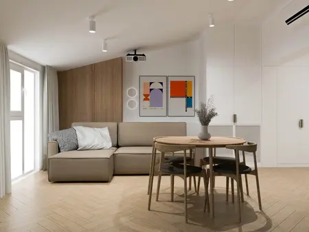Nowoczesne wnętrze z minimalistyczną kanapą i drewnianym stołem, idealne do małego salonu.