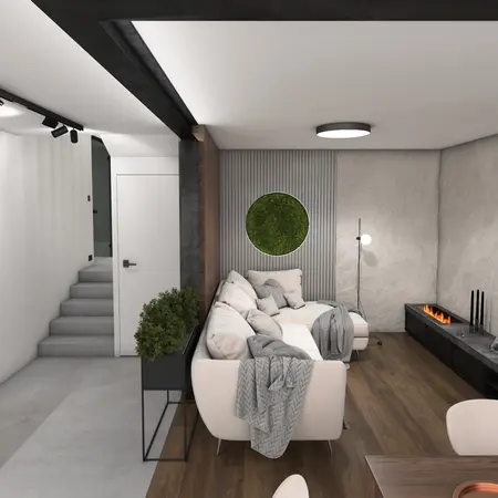 Wnętrze salonu w stylu minimalistycznym, z białą sofą, drewnianymi detalami i roślinnością.